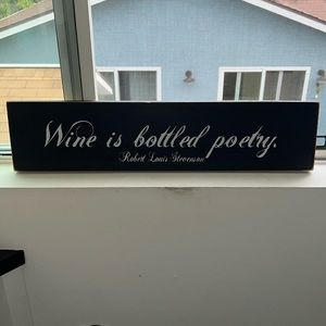 Wood Sign "Wine is bottled poetry"
